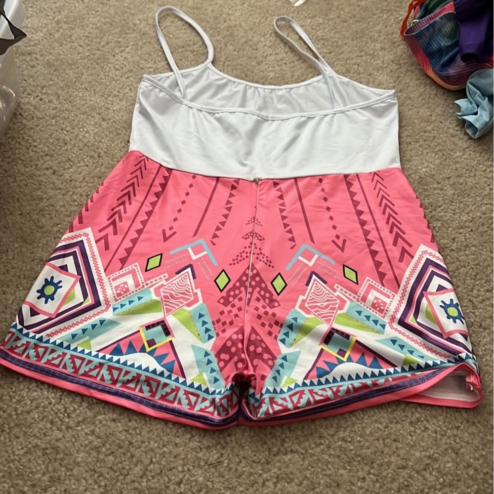 Woman’s romper. New never worn. Size medium